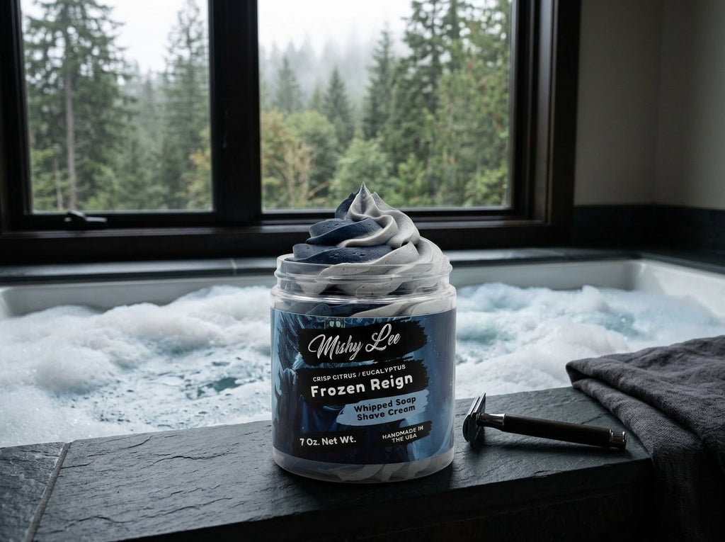 Whipped soap shave cream jar with navy whipped swirl placed beside cloth on table