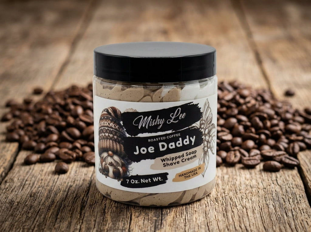 Whipped soap and shave cream jar on wooden surface with roasted coffee label