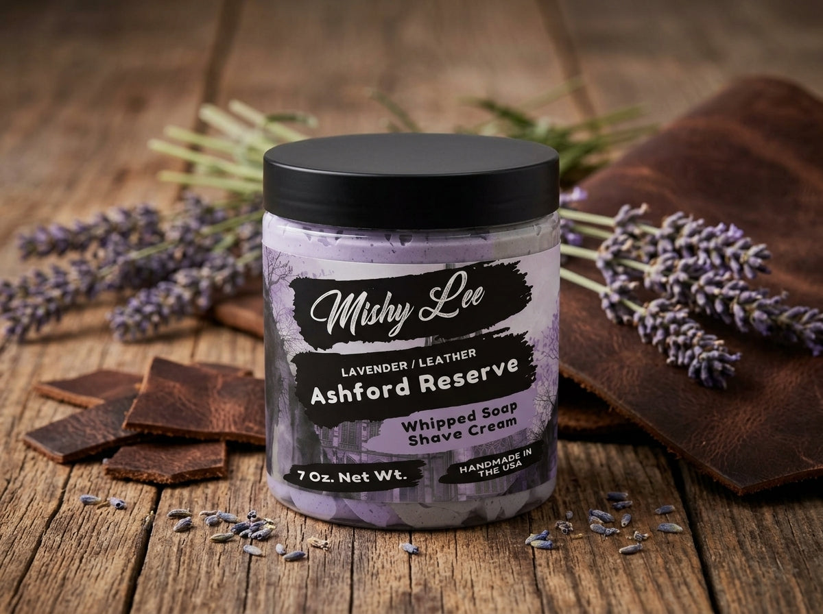 Whipped soap/shave cream jar on wooden surface with lavender sprigs, Lavender/Leather