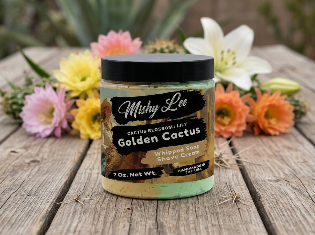 Whipped soap and shave cream jar on wood with pastel gold-and-green swirl topping