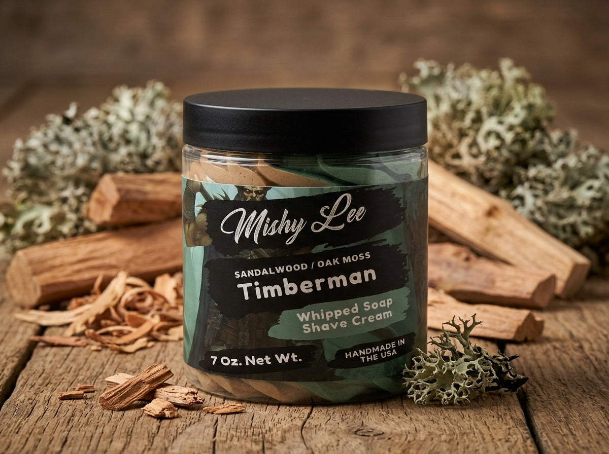Men's Timberman whipped soap and shave cream jar on wooden board with whipped swirls