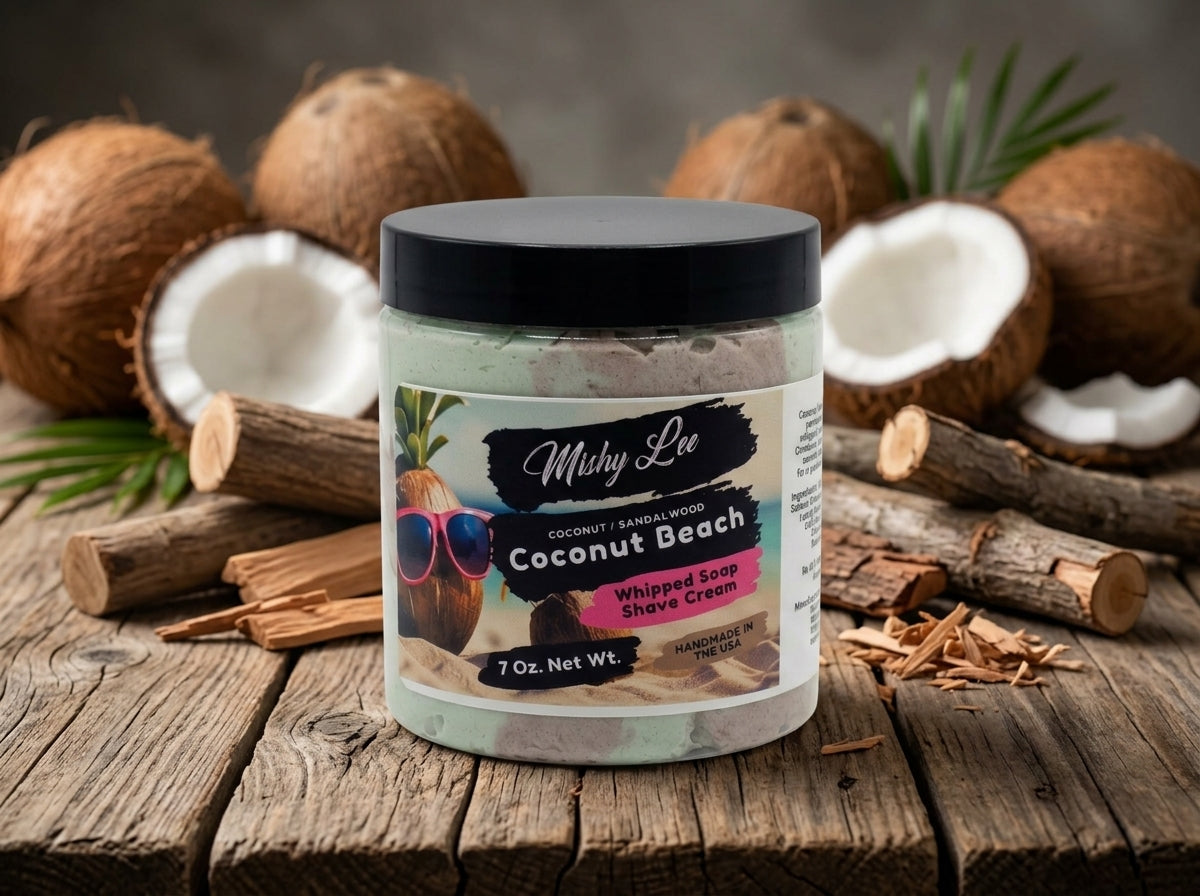 Mishy Lee Coconut Beach whipped soap and shave cream jar on wood with coconut shells