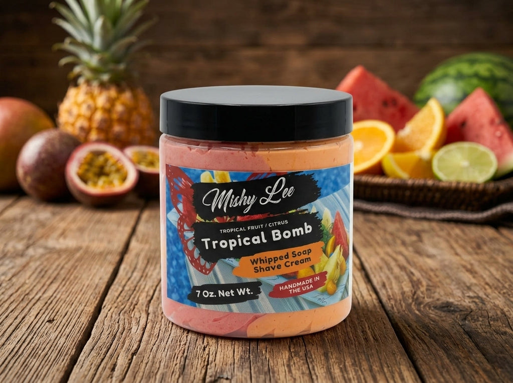 Whipped soap and shave cream jar with Tropical Bomb label, pink-orange soap inside