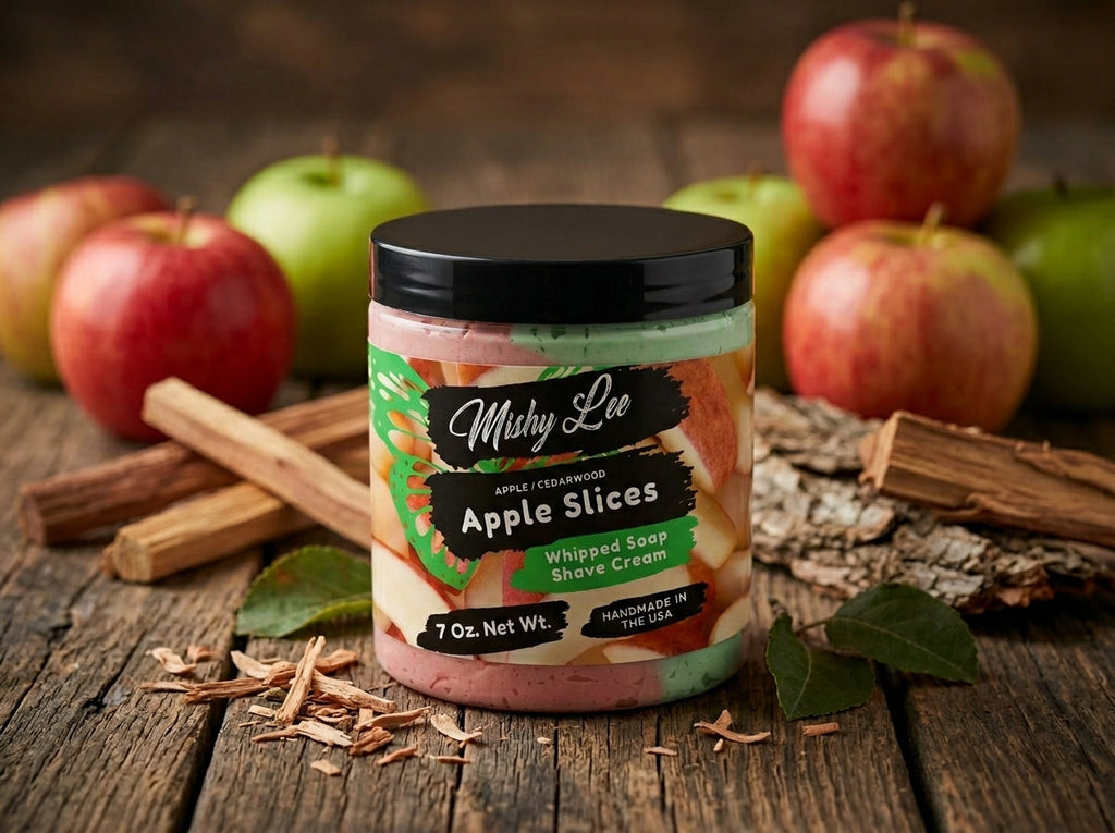 Whipped soap and shave cream jar on wooden surface with apples and cinnamon sticks