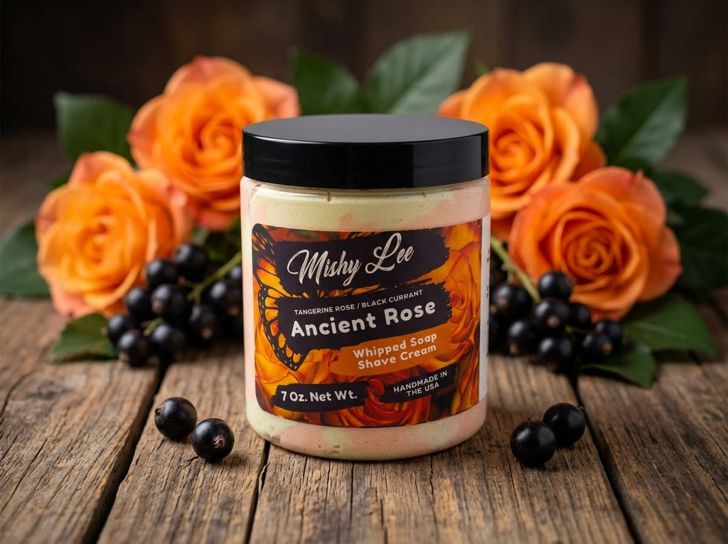 Whipped soap and shave cream jar with black lid and rose-colored swirl top
