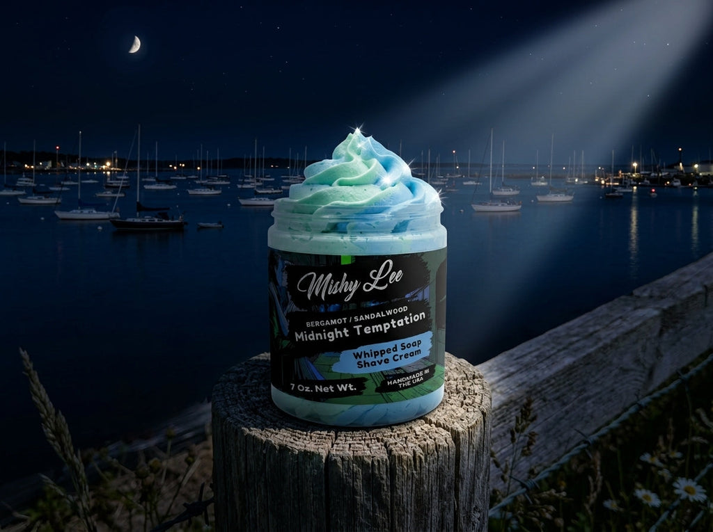 Mishy Lee whipped shave cream jar standing on a dock, mint and blue swirled top