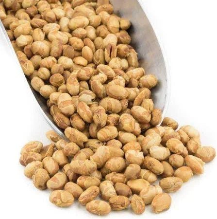 Dry roasted salted soy nuts, in-shell kernels scattered