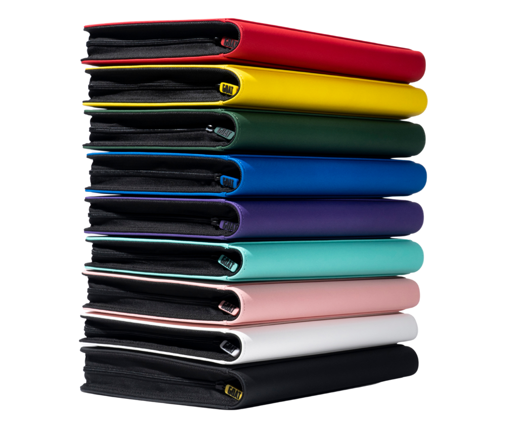 Stack of color card binders: red, yellow, green, blue, purple, pink, mint, white, black.