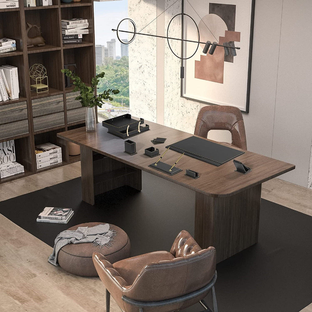 Modern desk organizer set with black desk pad, trays, and pen accessories on a work surface