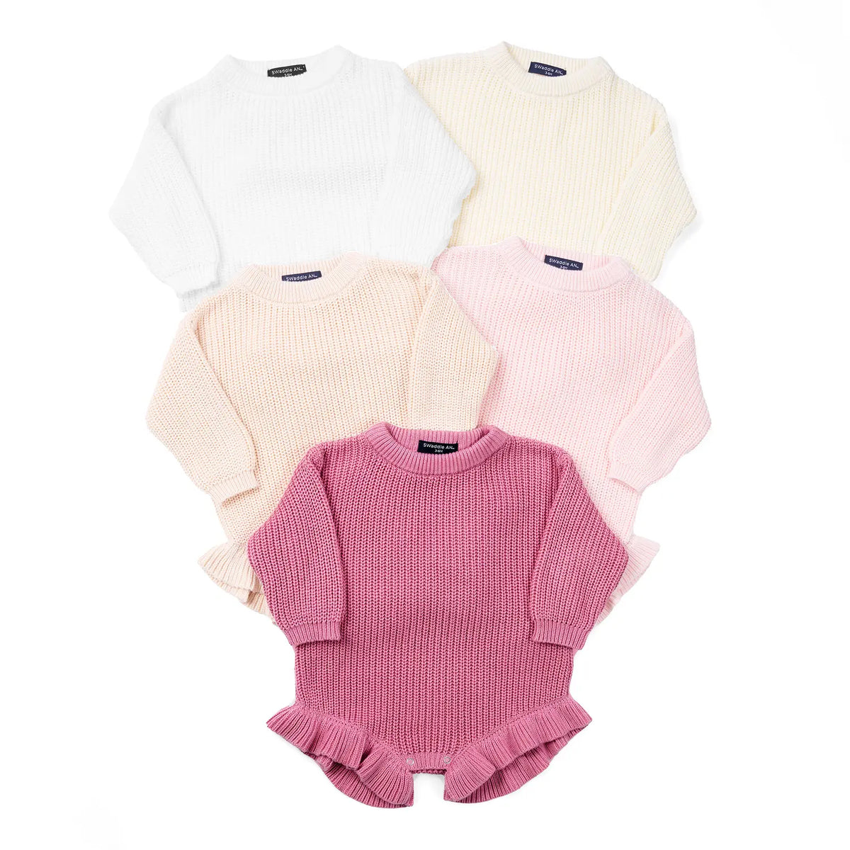Pink knit baby romper in a multi-color assortment with ruffled cuffs and snap legs
