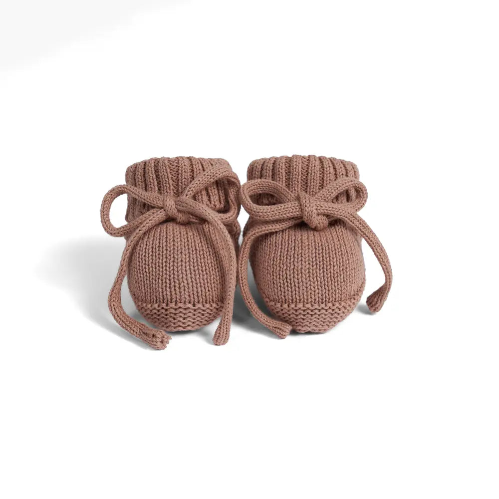 Mocha knitted baby booties with tied bow laces, front view pair
