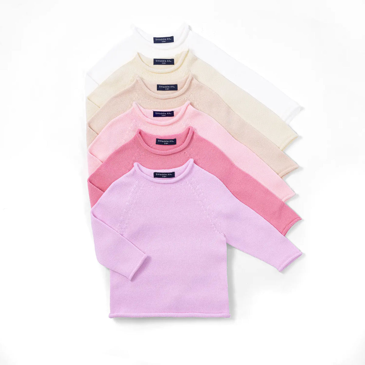 Assorted knit rollneck baby sweaters: lilac, pink, and cream (set)