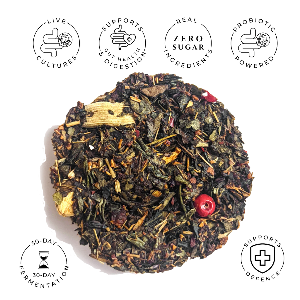 Sweet Cinnamon Chai probiotic white tea disc with dark tea leaves and visible spice pieces.