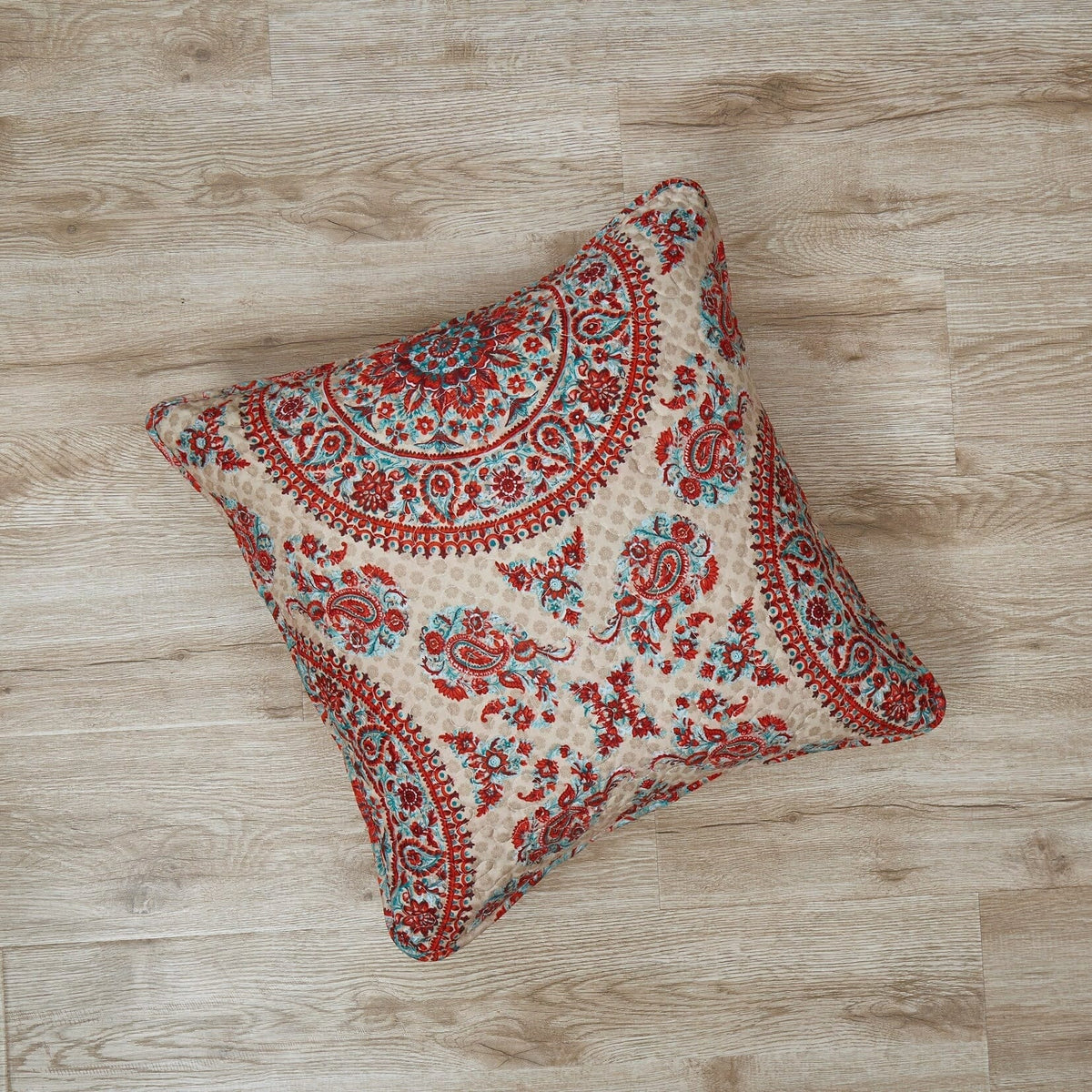 Bohemian throw pillow cover with scrolling paisley border in red and teal on off-white