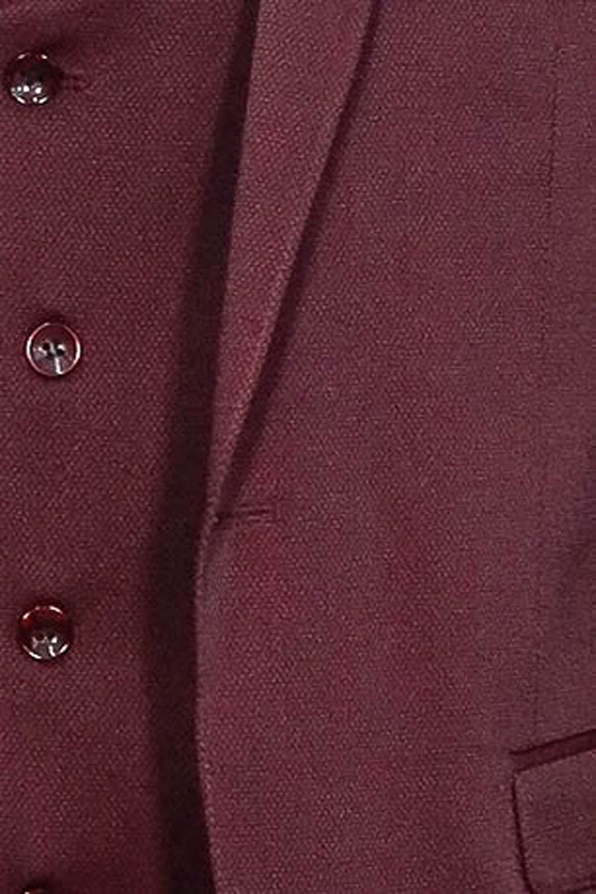 Burgundy waistcoat and suit jacket front with button and lapel detail