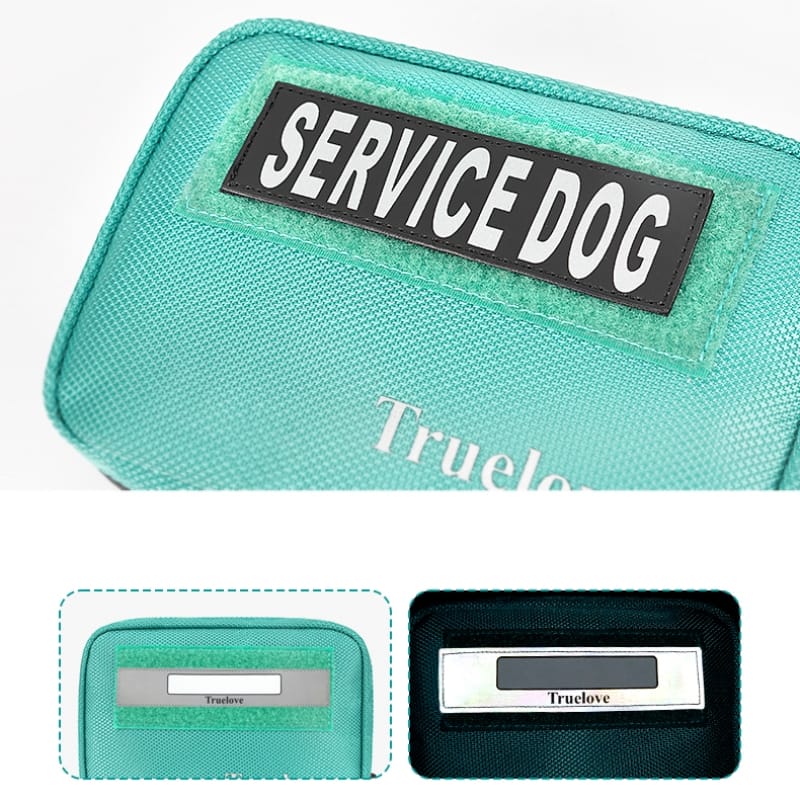 Teal pet pouch with black “SERVICE DOG” label patch on the front