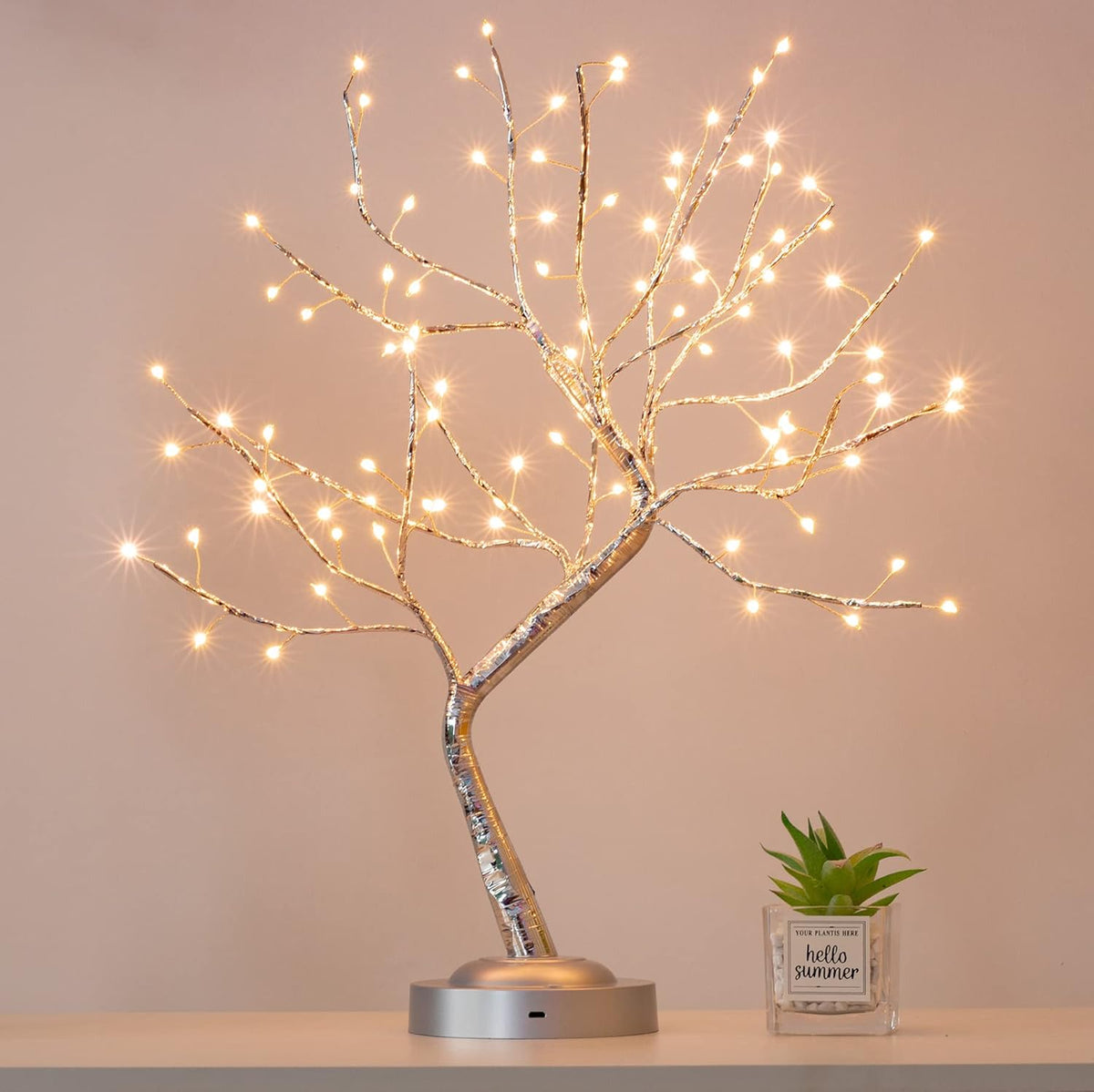 Warm white LED light tree with dense branches on round base