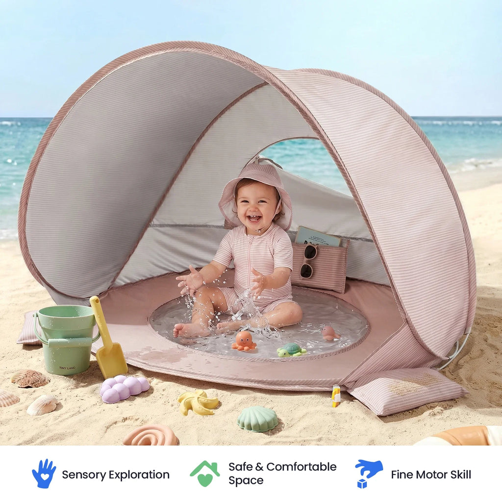 Pink 3-in-1 baby beach tent with mesh doorway and baby with bath toys inside