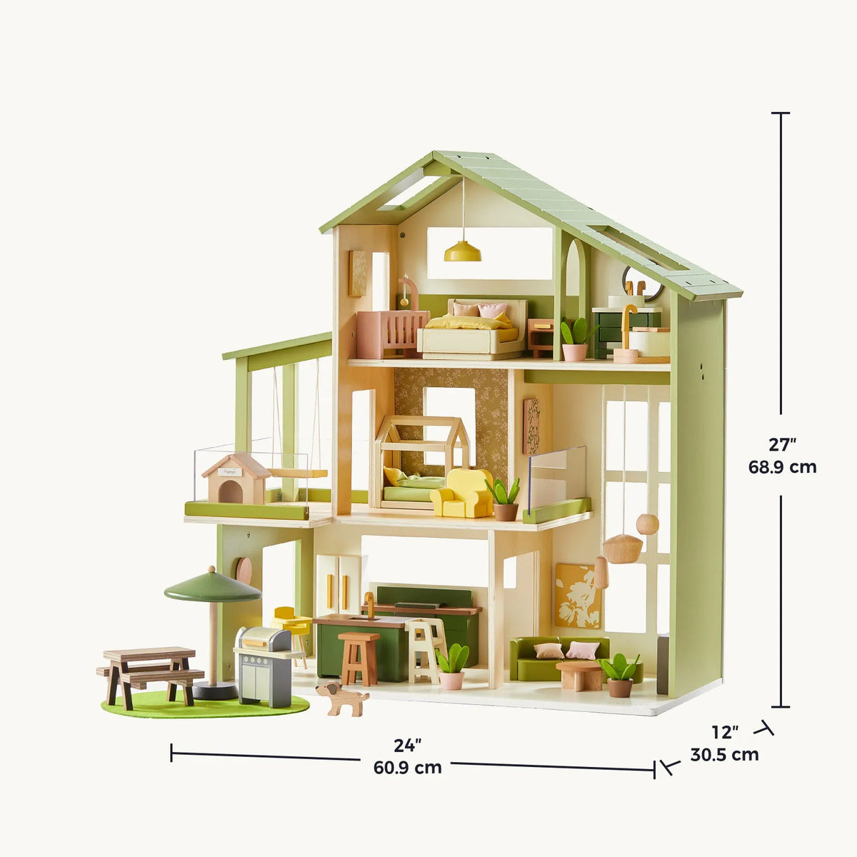 Green Tiny Land dollhouse with cream walls, three levels, and an angled roof