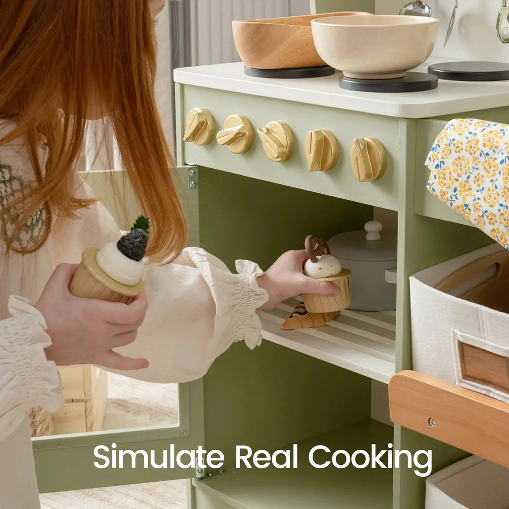 Sage green play kitchen with sink area and open shelf storage