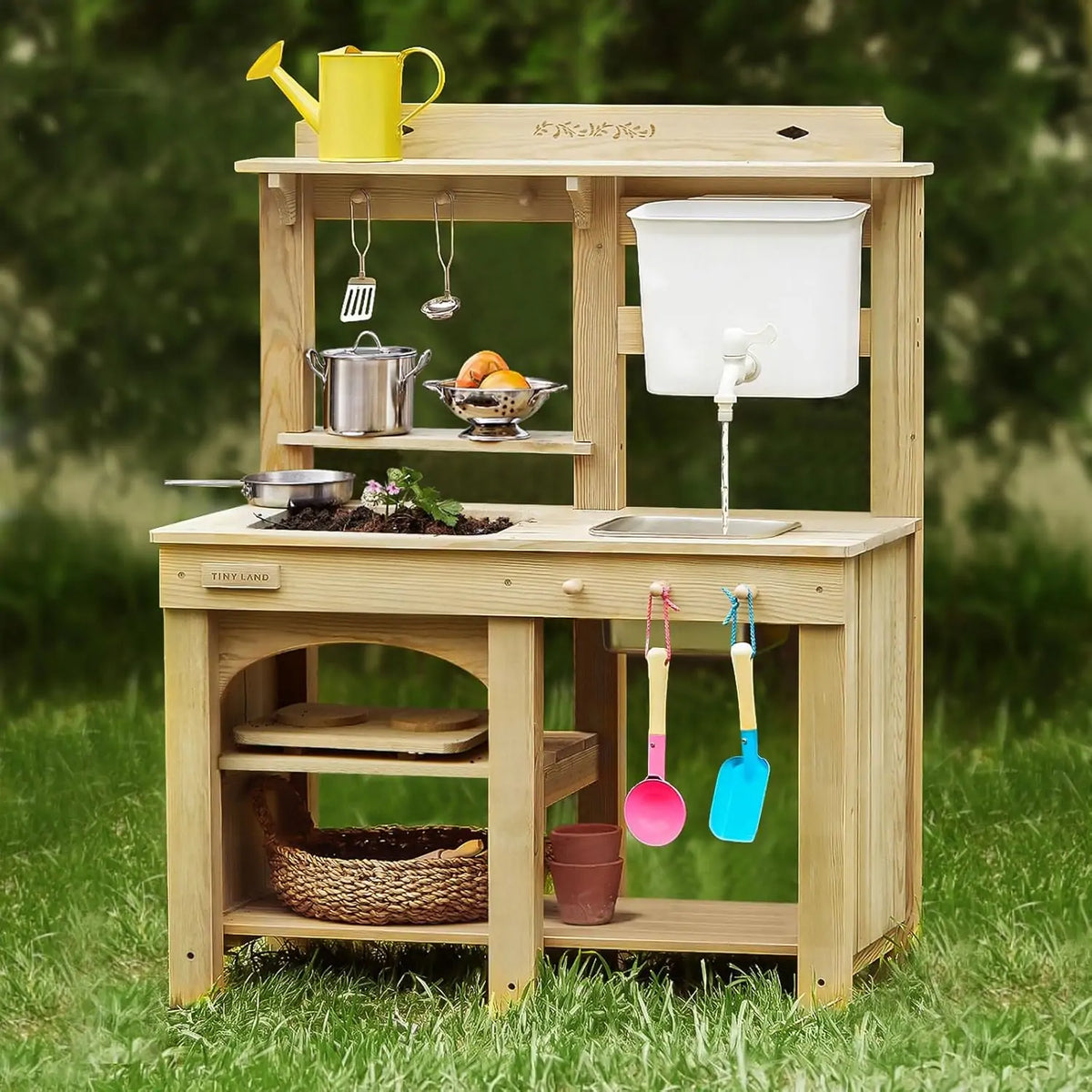 Kids mud kitchen playset with wooden counter, sink, and hanging utensils accessories