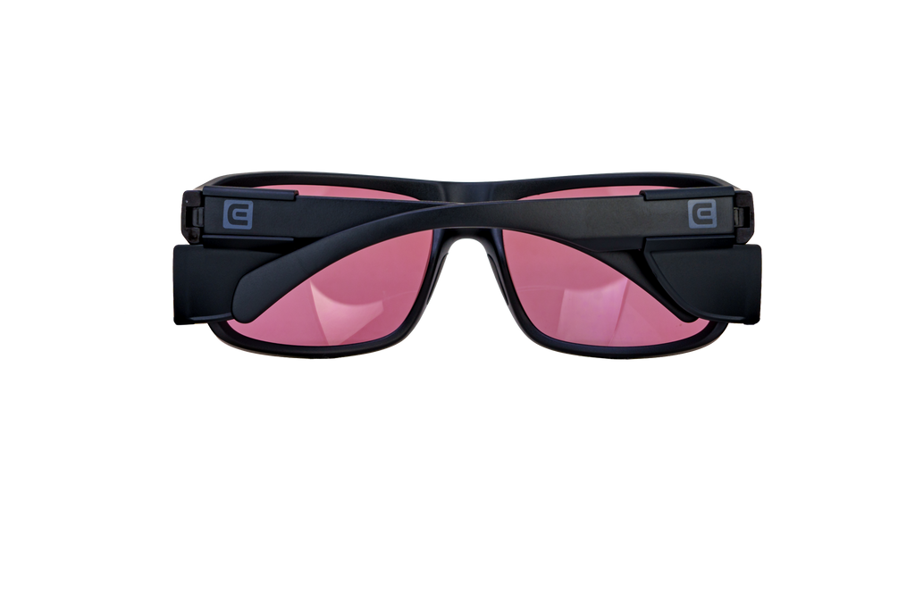 Black sunglasses front view with rose pink lenses and logo detail on temples