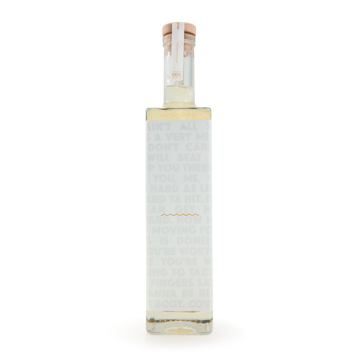 Tobacco & Vanilla bubble bath bottle back view with faint label text and barcode area.