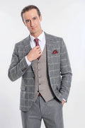Slim-fit checked grey suit with waistcoat, maroon tie, and red pocket square