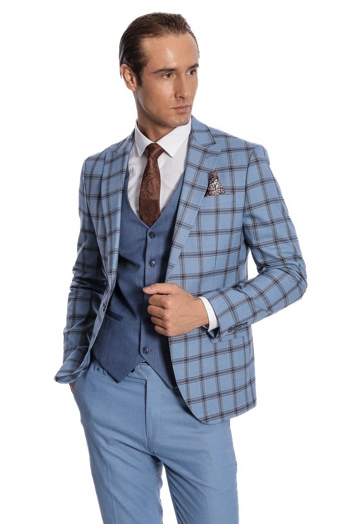 Men's slim fit suit jacket in light blue plaid with blue vest and brown tie, side pose