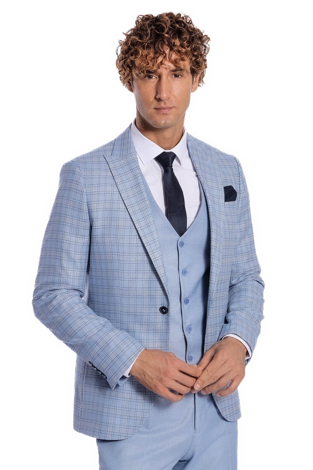 Light blue checked suit jacket with black tie, vest buttons, and pocket square.