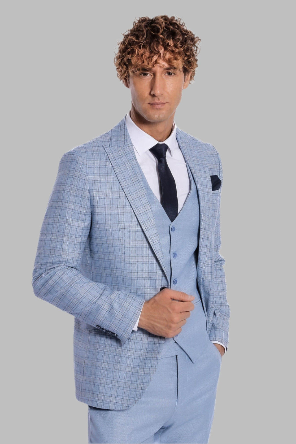 Light blue checked slim-fit suit with black tie and dark pocket square.