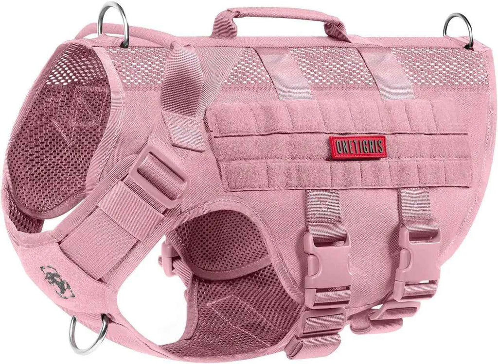 Pink nylon dog harness with mesh panels, dual handles, buckles and metal D-rings