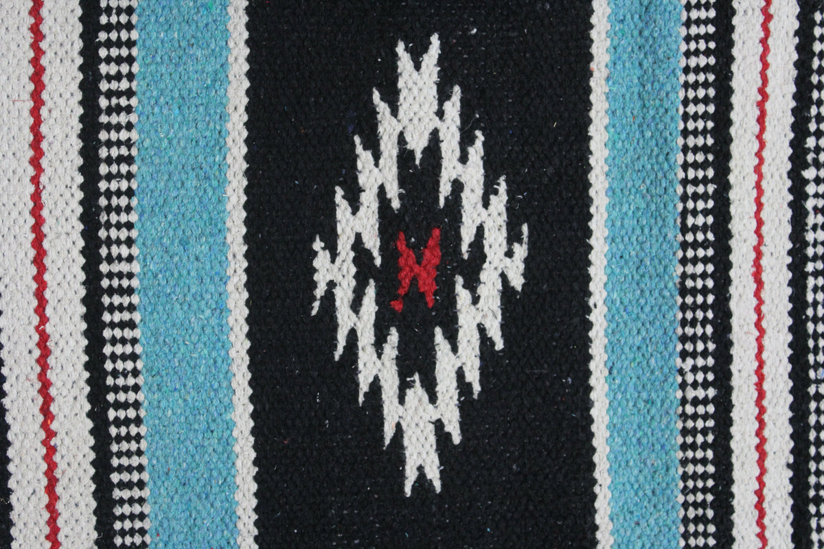 Western saddle blanket in black with turquoise side stripes and white/red diamond motif