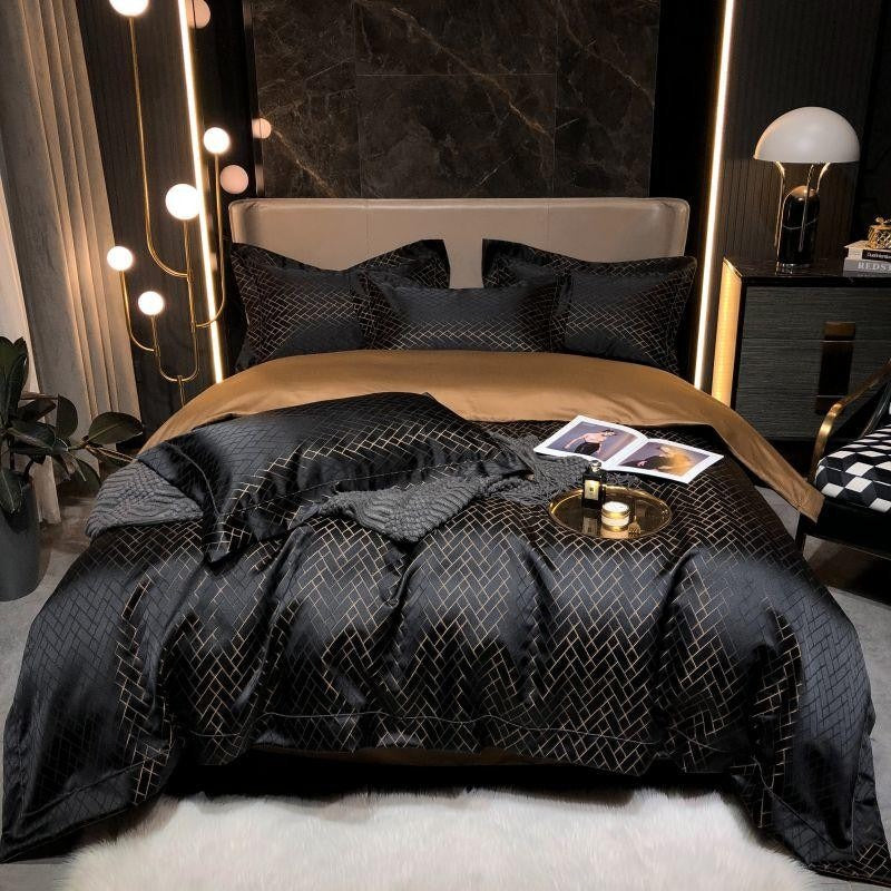 Black cotton satin bedding set with gold geometric grid pattern and matching pillowcases