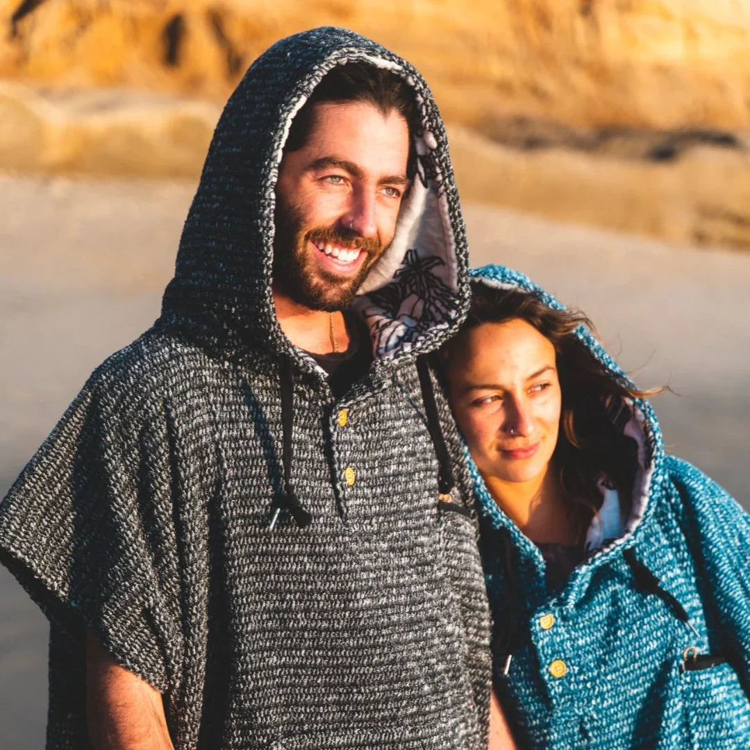 Dark heather knit blanket hoodie with hood, short sleeves and front button placket