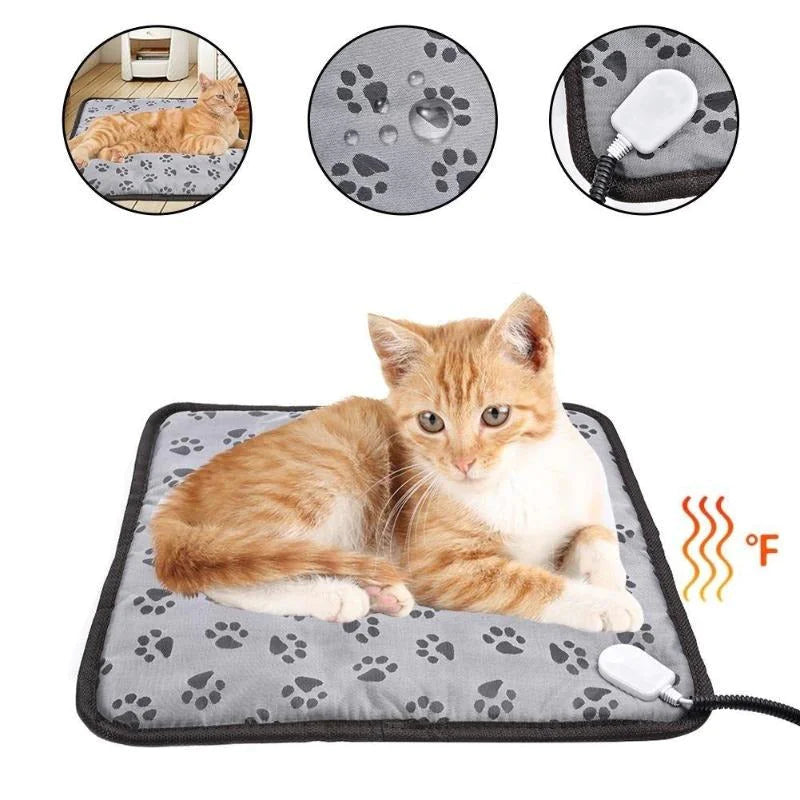 Heated pet blanket with paw-print fabric, white heating pad connector and control icons