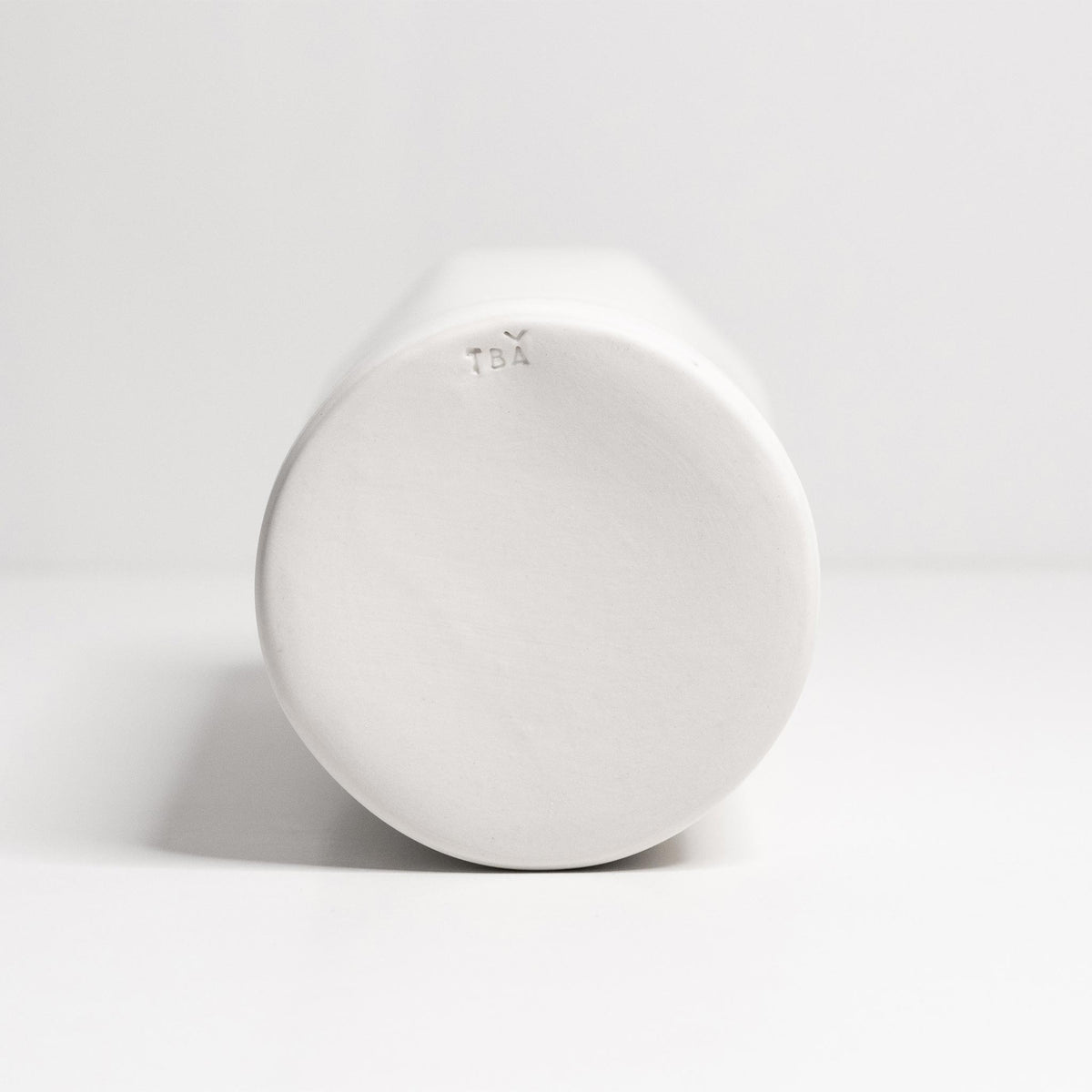 Handmade porcelain flower vase, silk white, round base shown