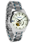 Women's silver wristwatch with blue accents, cream dial, gold subdials, round face