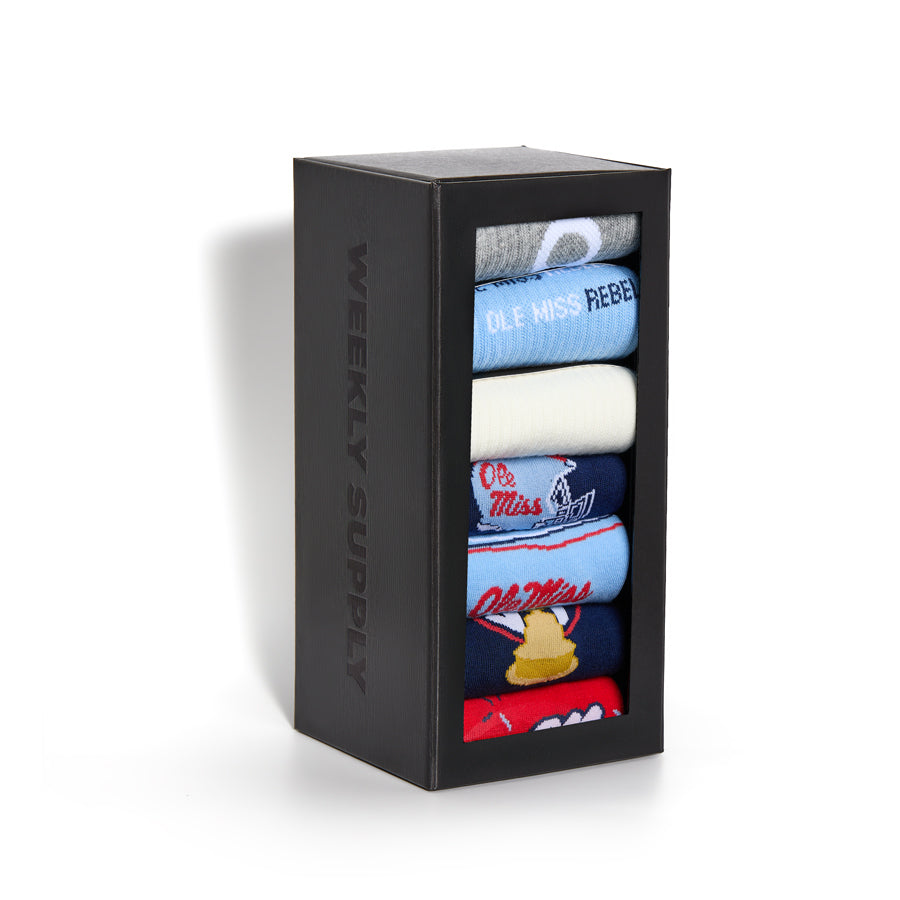 Socks gift set in a black box, showing printed navy, white, and red styles.