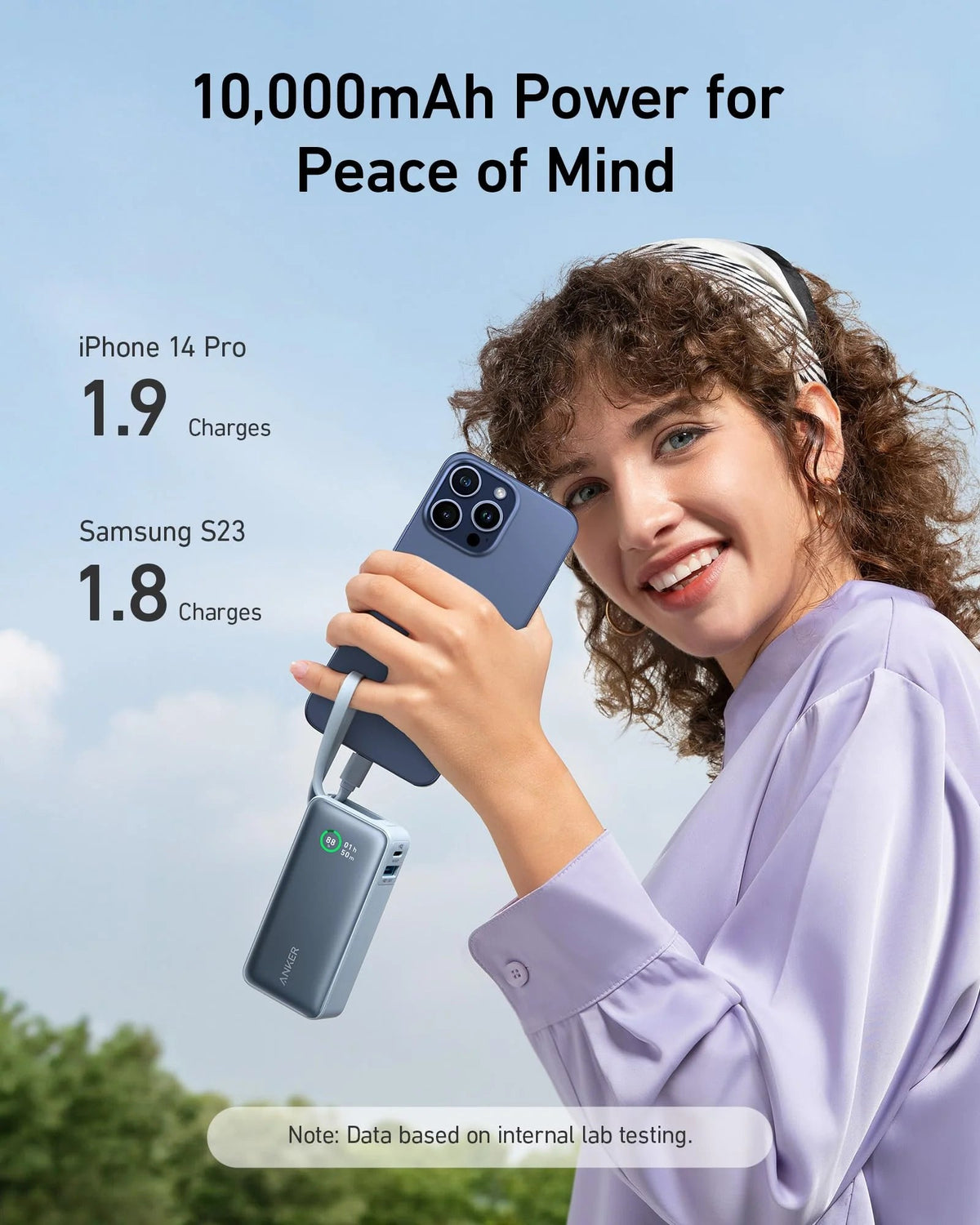 Portable power bank with built-in USB-C cable, light blue, compact rectangular
