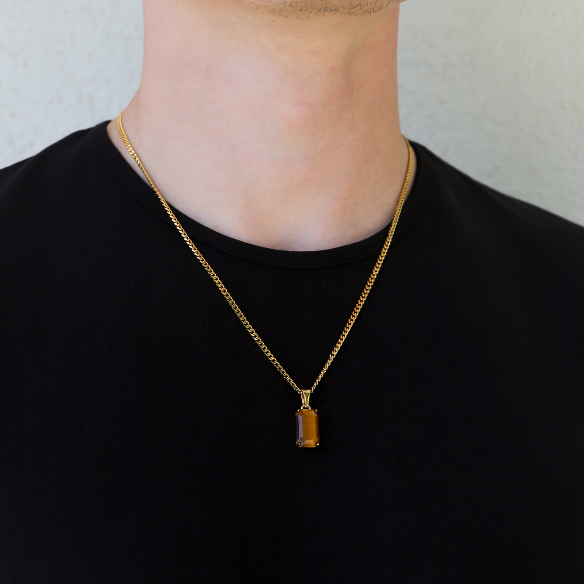 Tiger eye pendant necklace in gold-tone with rectangular amber-brown stone