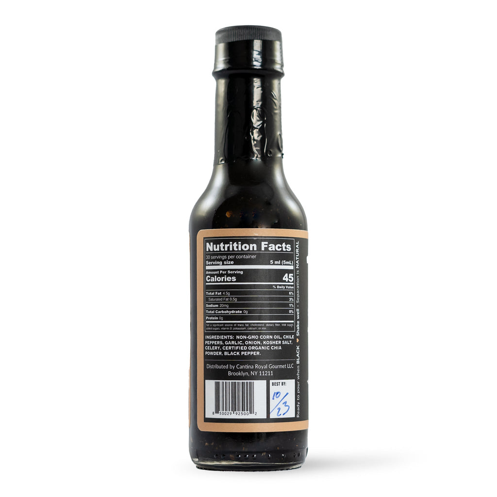 Hot sauce bottle with nutrition facts label and ingredients panel.