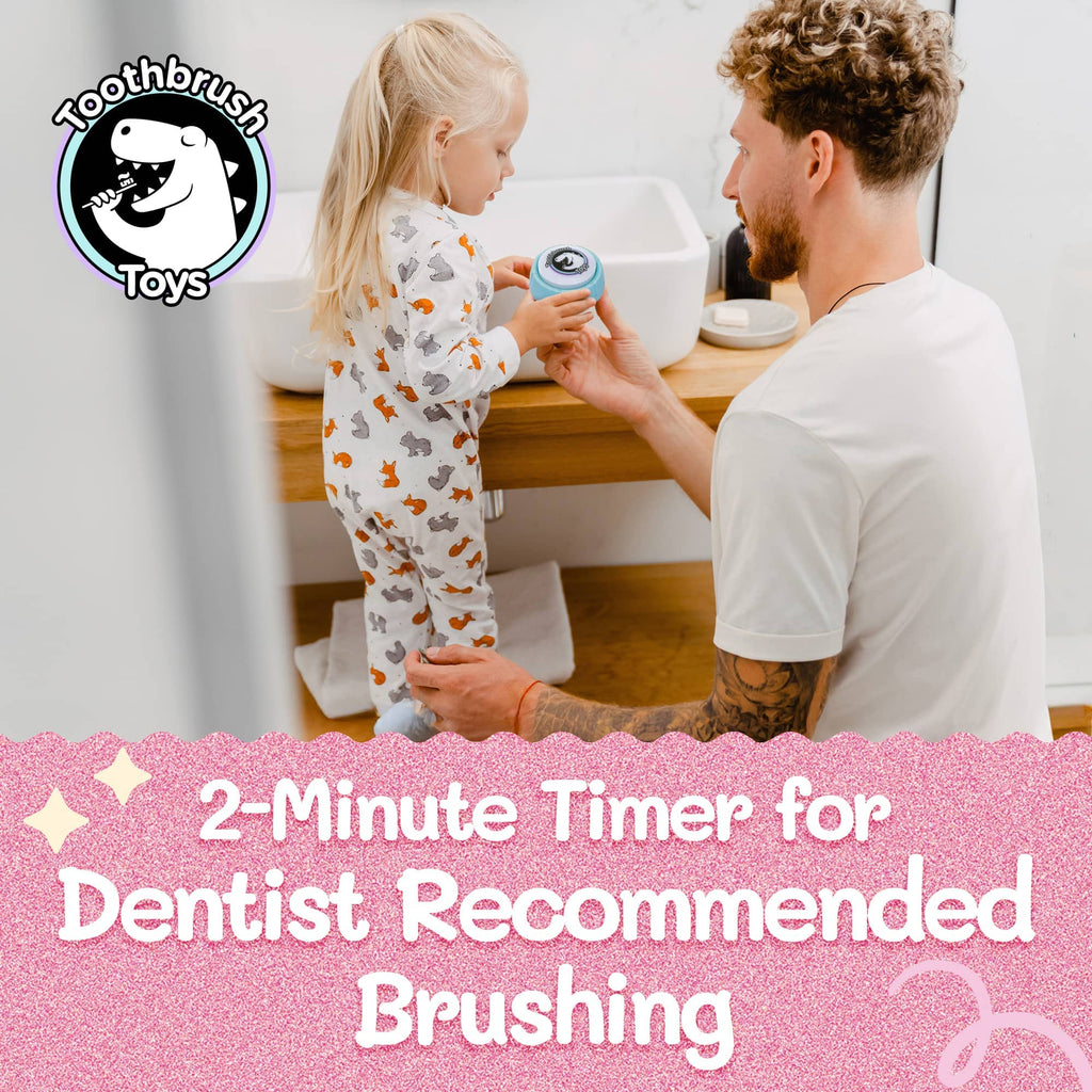Toothbrush timer toy in use, light-blue device held by child near a sink
