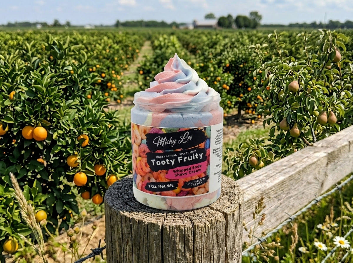 Whipped soap and shave cream jar on fence in citrus grove