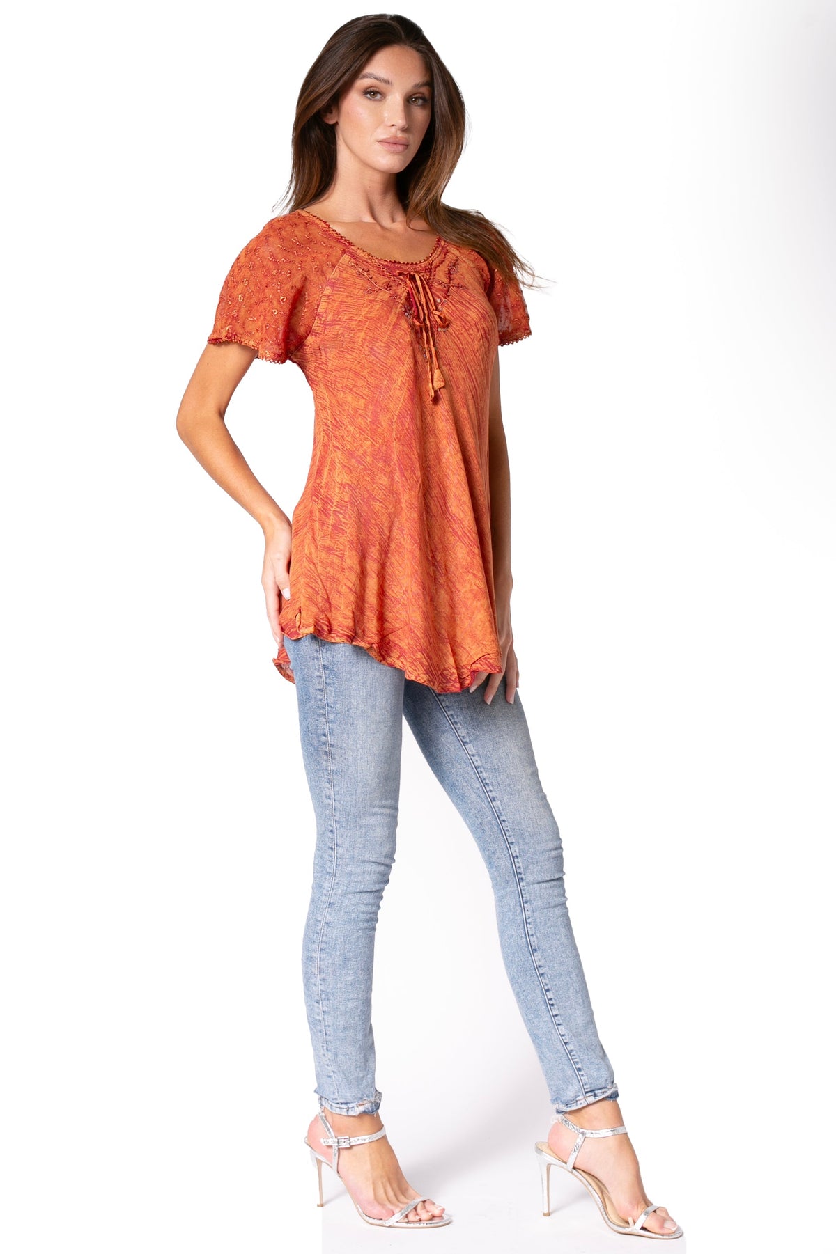 Orange tunic blouse with neckline sequin embroidery and tie-front scoop neck, front view