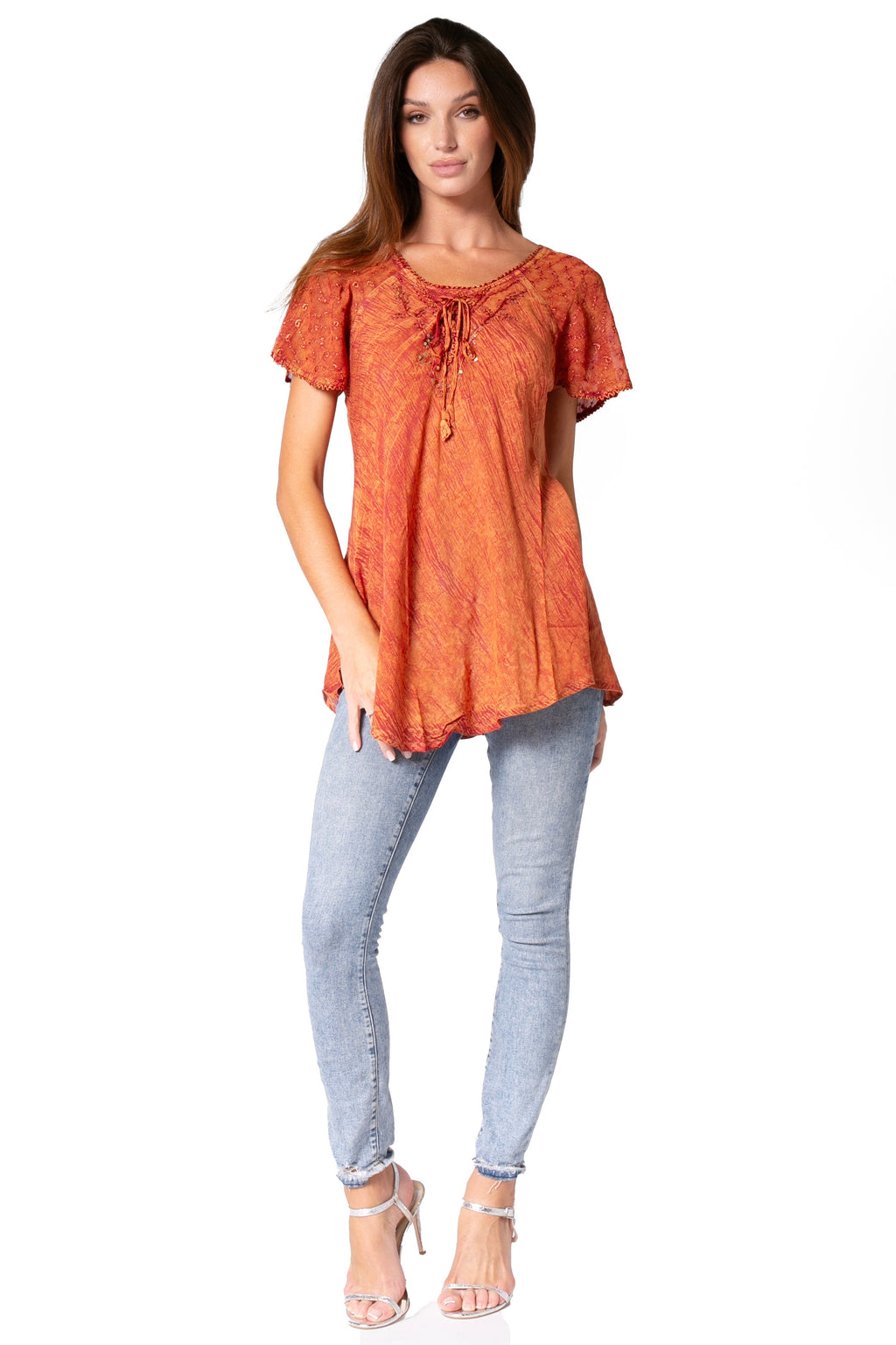 Orange relaxed-fit blouse with sequin-embroidered scoop neck and lace-trim flutter sleeves, full body