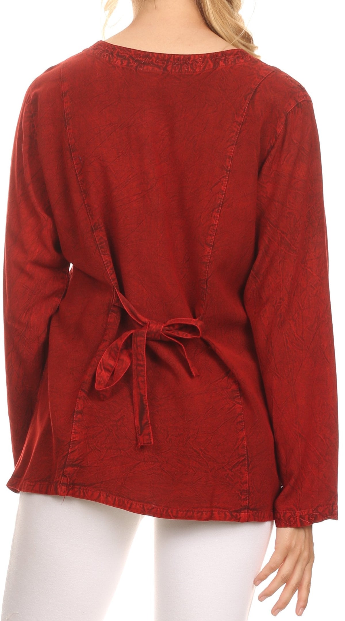 Red blouse back view with tied adjustable strap and buttoned center back seam