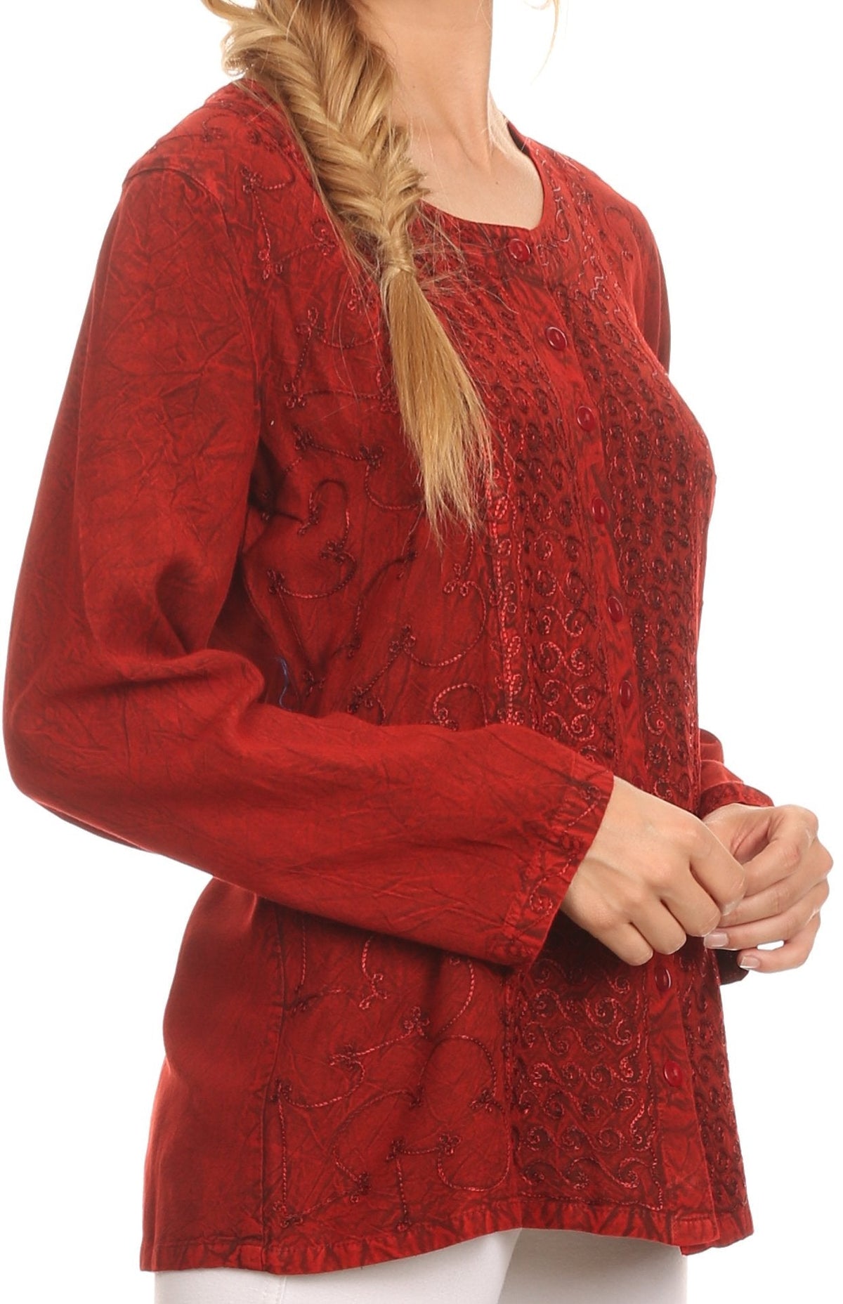 Red long-sleeve blouse with deep scoop neck, button front, and intricate allover pattern