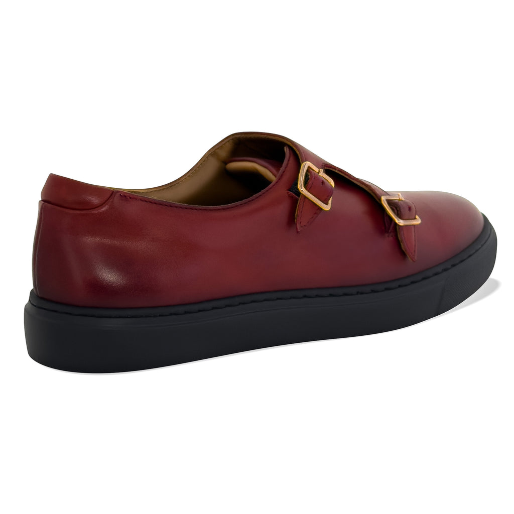 Women’s dark red slip-on shoes, rear view shows low heel and cushioned collar padding