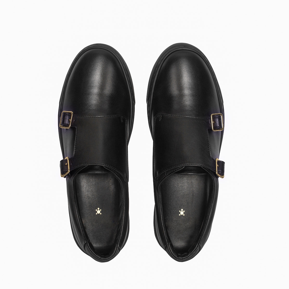 Pair of black slip-on loafers with gold-tone buckles